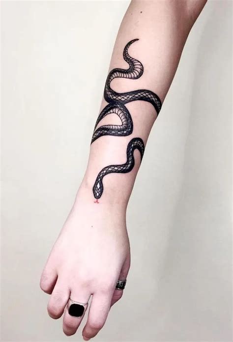 snake around arm tattoo meaning